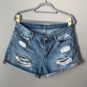 Medium Length Distressed Jean Shorts
